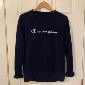 Dark blue champion crew neck sweater.